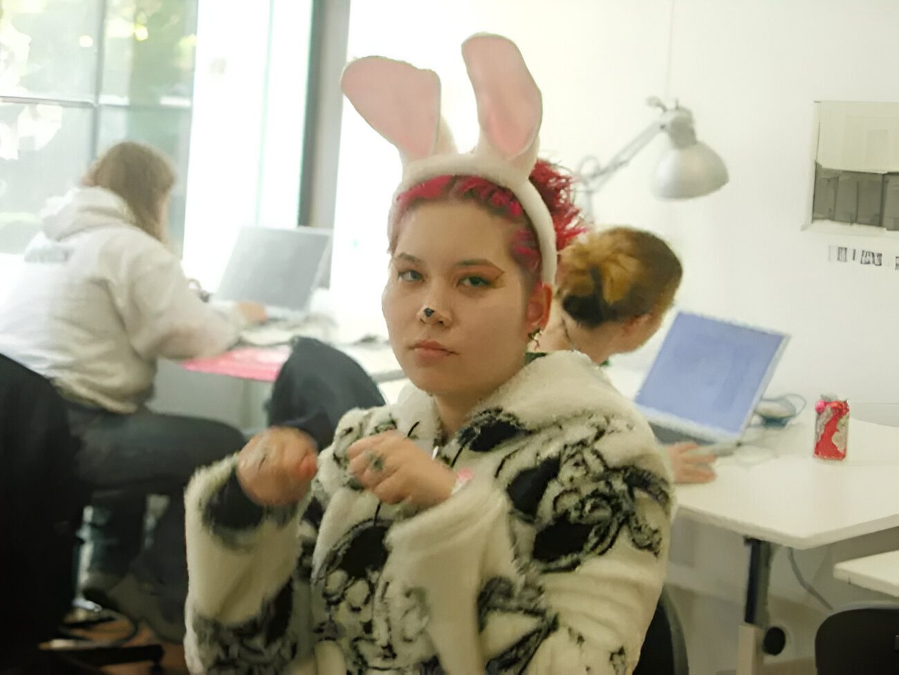 A blue and white logo for suffix design.