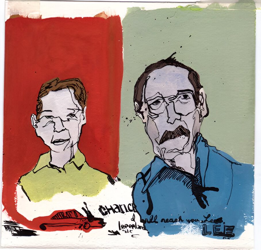 Two men are standing next to each other.